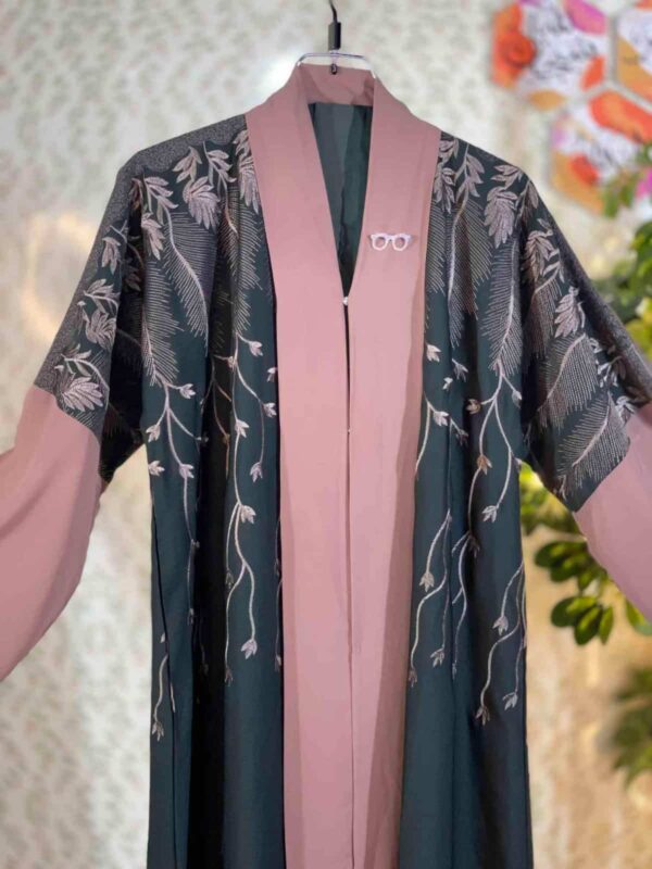 Dubai embroidered abaya in deep green with dusty rose panel and elegant leaf embroidery