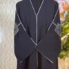 Elegant black Dubai abaya with double-layer sleeves featuring golden and transparent stonework