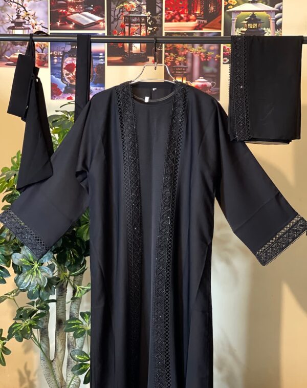 Dubai Stylish Black Burqa with Hijab and Inner – ঝালি কাটা ডিজাইন ও হালকা ব্ল্যাক স্টোনওয়ার্কসহ প্রিমিয়াম নিদা বোরকা