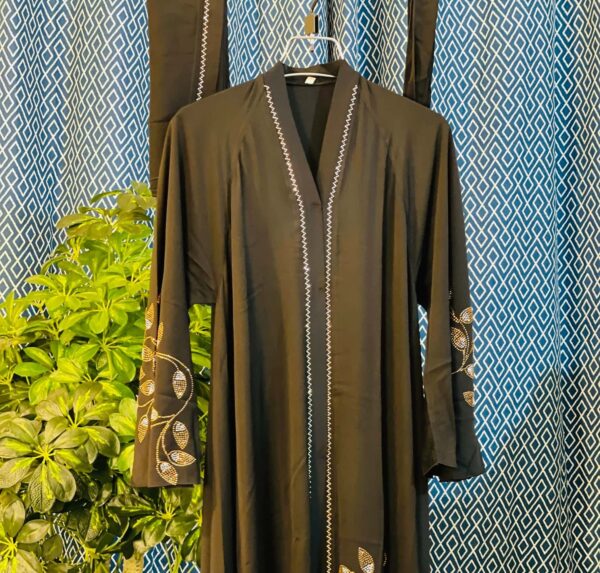 Black Dubai burqa with intricate stone work – perfect for elegant modest fashion in Bangladesh.