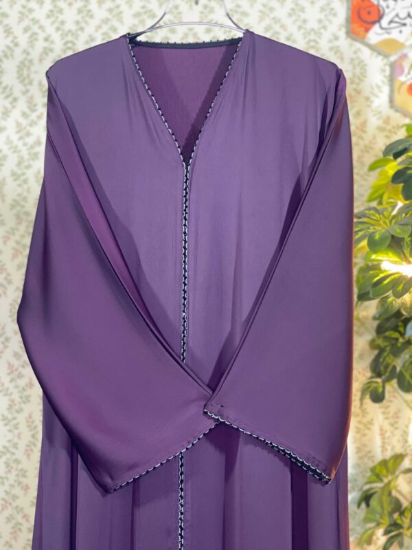 Elegant purple zafran abaya with crystal lace on hands and center